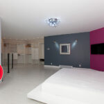Bedroom with new trim, flooring and wall finishes