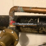 Frozen plumbing line with ice buildup