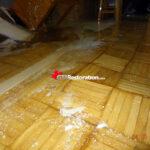 Technician using a moisture meter