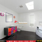 Vanity with wall-mounted mirror