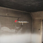 Soot and smoke damage inside a residential kitchen